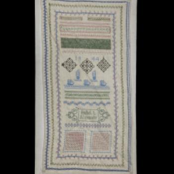 Sampler sewn onto linen