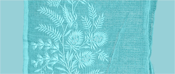 Blue item embroidered with a floral pattern